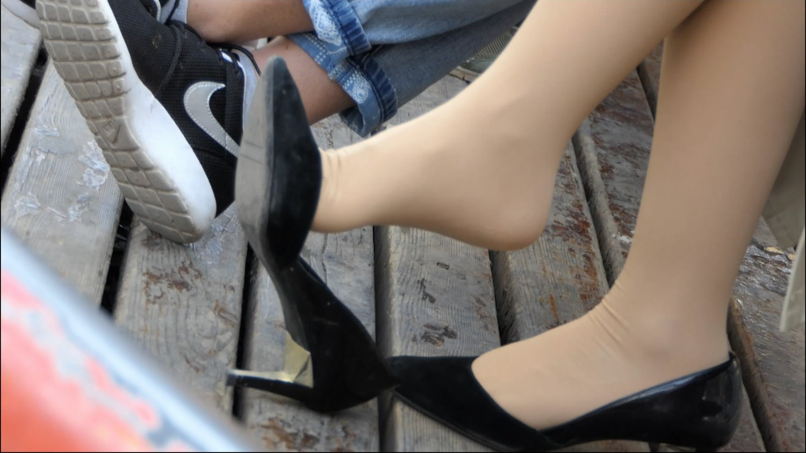 Orange juice with dangling legs